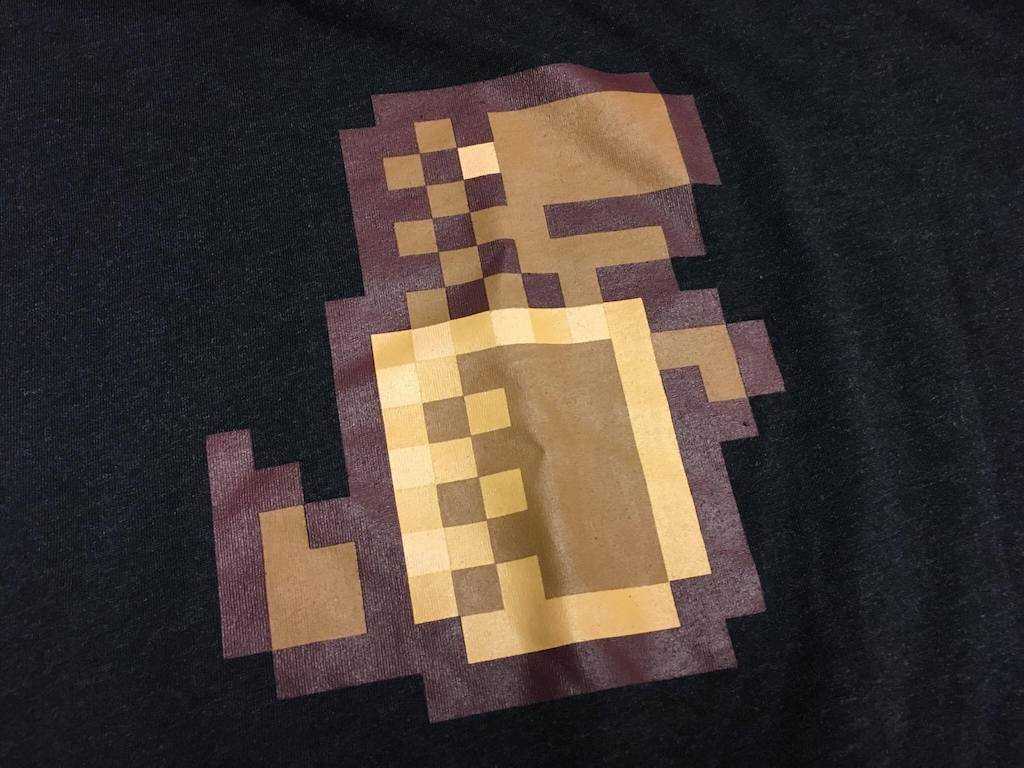 Printed Milo Dinosaur logo on a t-shirt