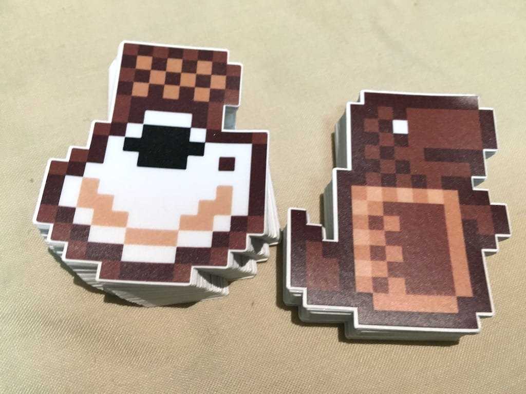Pixelated KopiJS and Milo Dinosaur stickers, from StickerHD